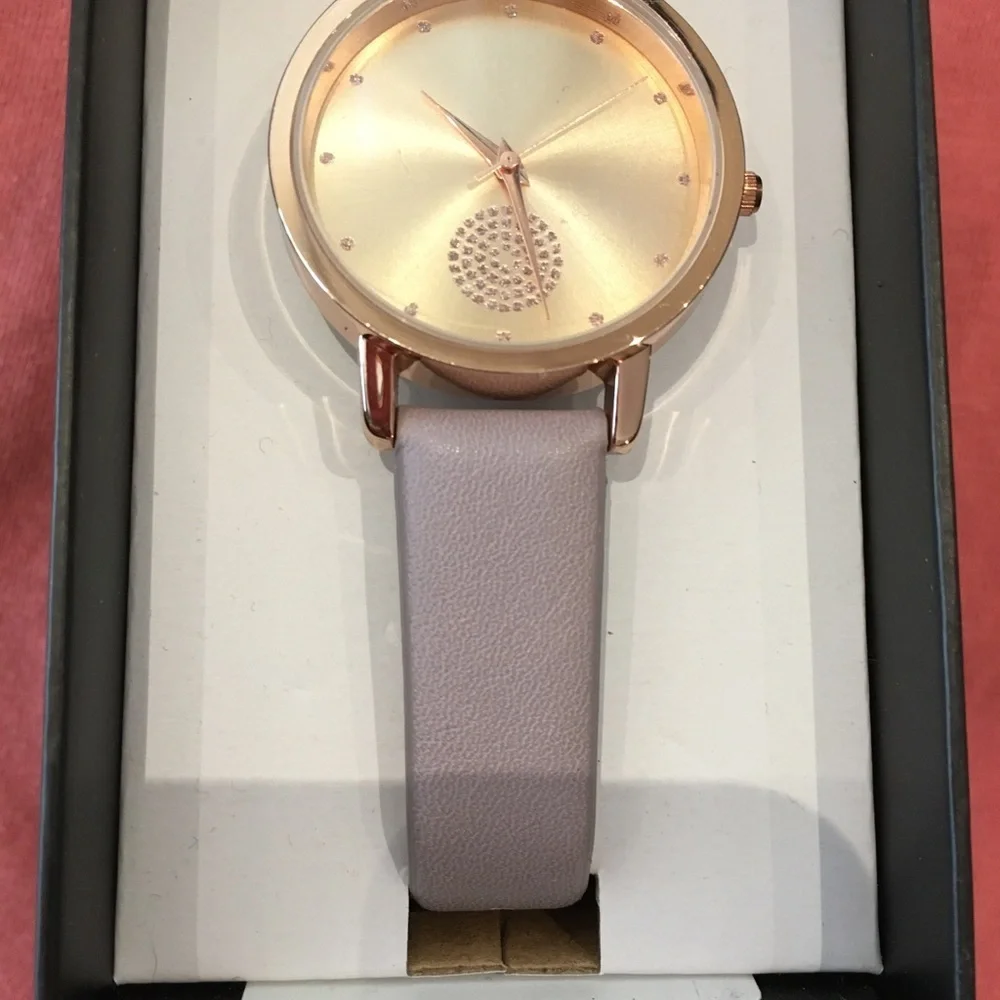 Watch Geneva light mauve band & gold face!